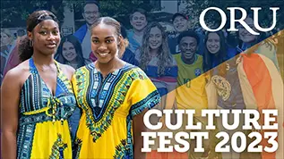 Video Thumbnail of two female students dressed blue and yellow traditional dresses from their country in Africa