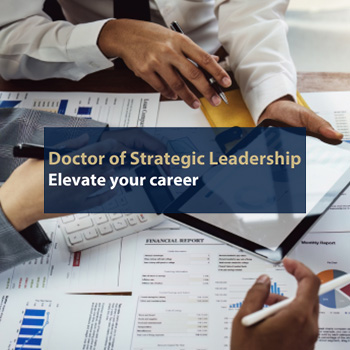 Picture showing the hands of people working at a desk with a caption that reads Doctor of Strategic Leadership, Elevate Your Career