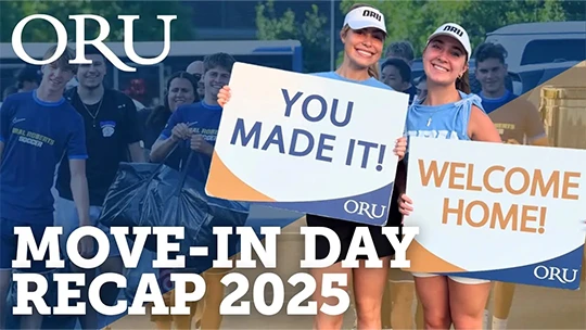 Video Thumbnail showing two students smiling holding signs welcoming students to 'Move-in Day 2025'.