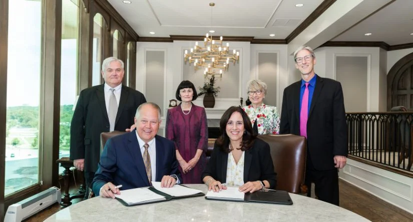 Dr. Wilson signing ceremony